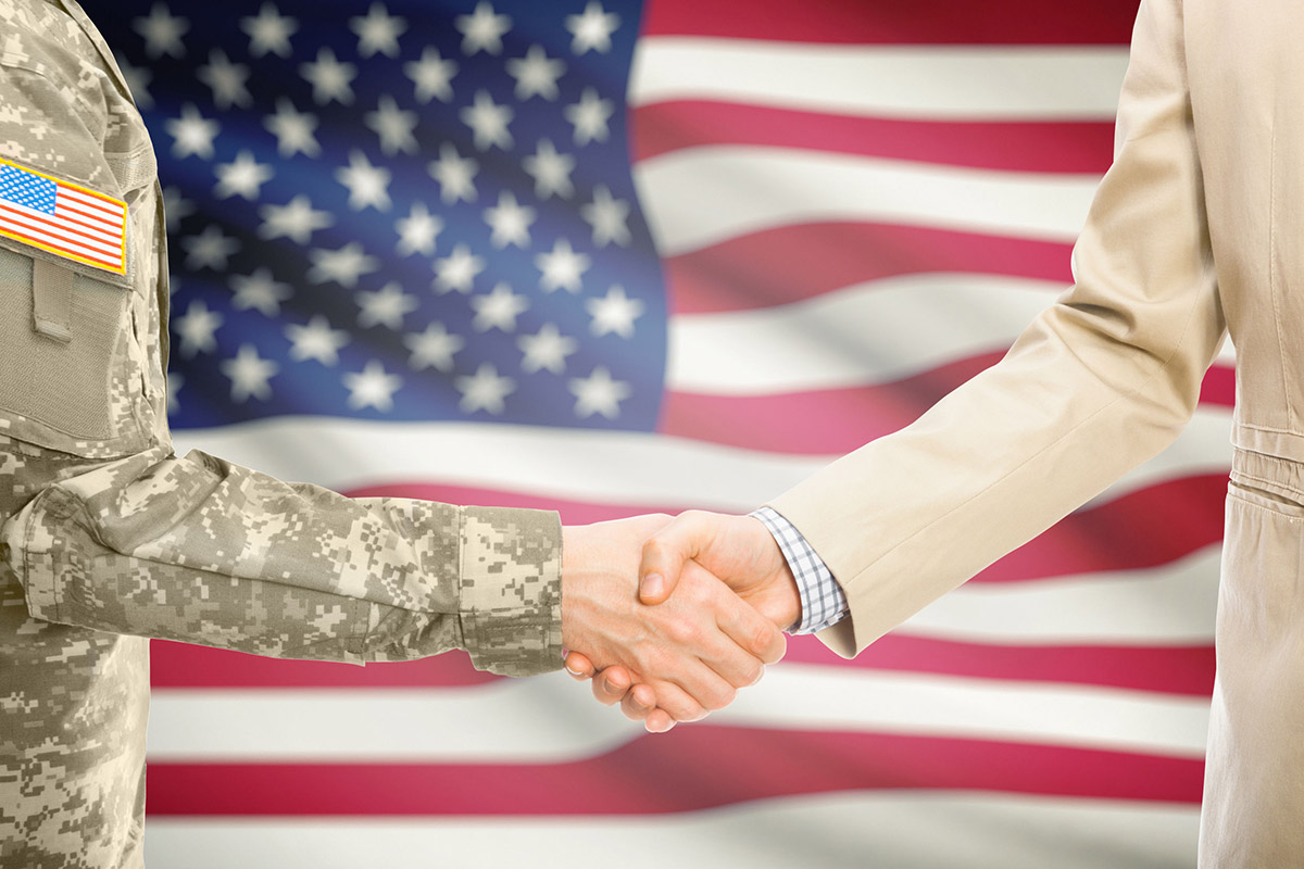 public sector data consulting and analytics, shaking hands with a US army official